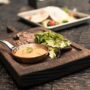 gourmet restaurant food on wooden rustic table