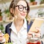 Woman during the business lunch in the vegan restaurant