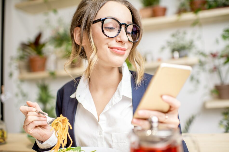 Woman during the business lunch in the vegan restaurant